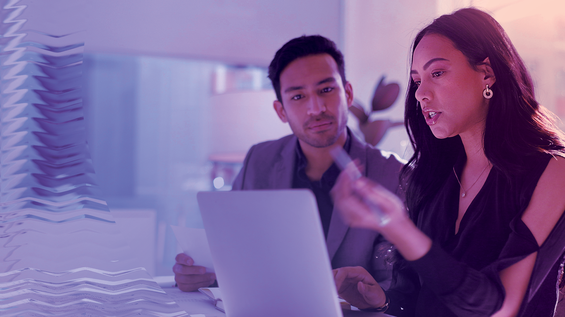 Image of a smart woman talking to a colleague